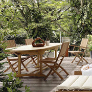 Prémium minőségű, mediterrán stílusú, összecsukható kézműves kerti teakfa karosszék  asztallal a dzsungelben 