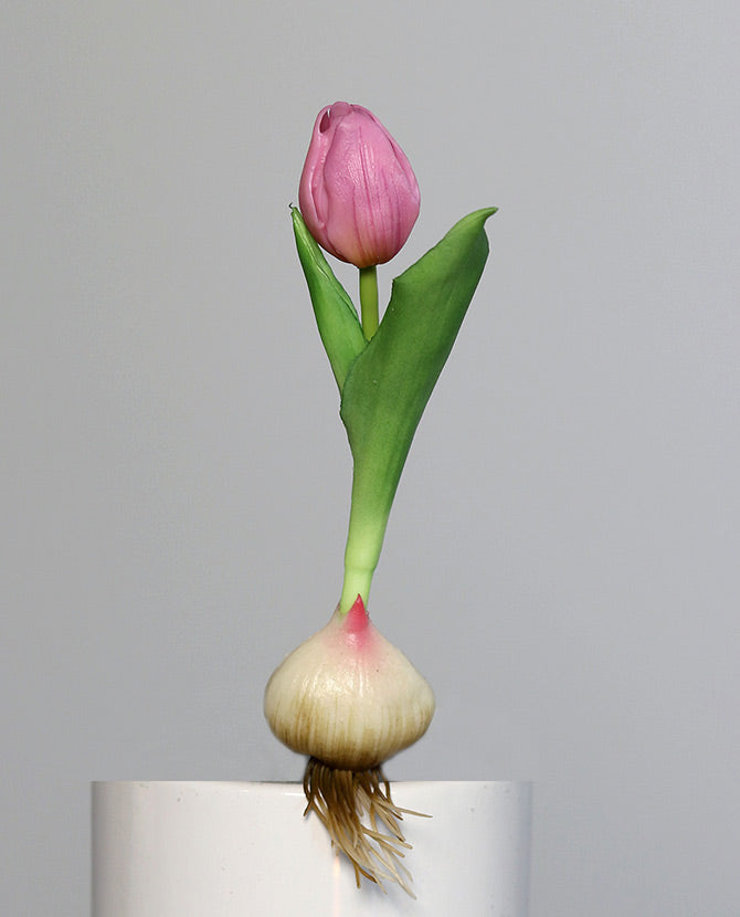 Rózsaszín színű hagymás mű tulipán