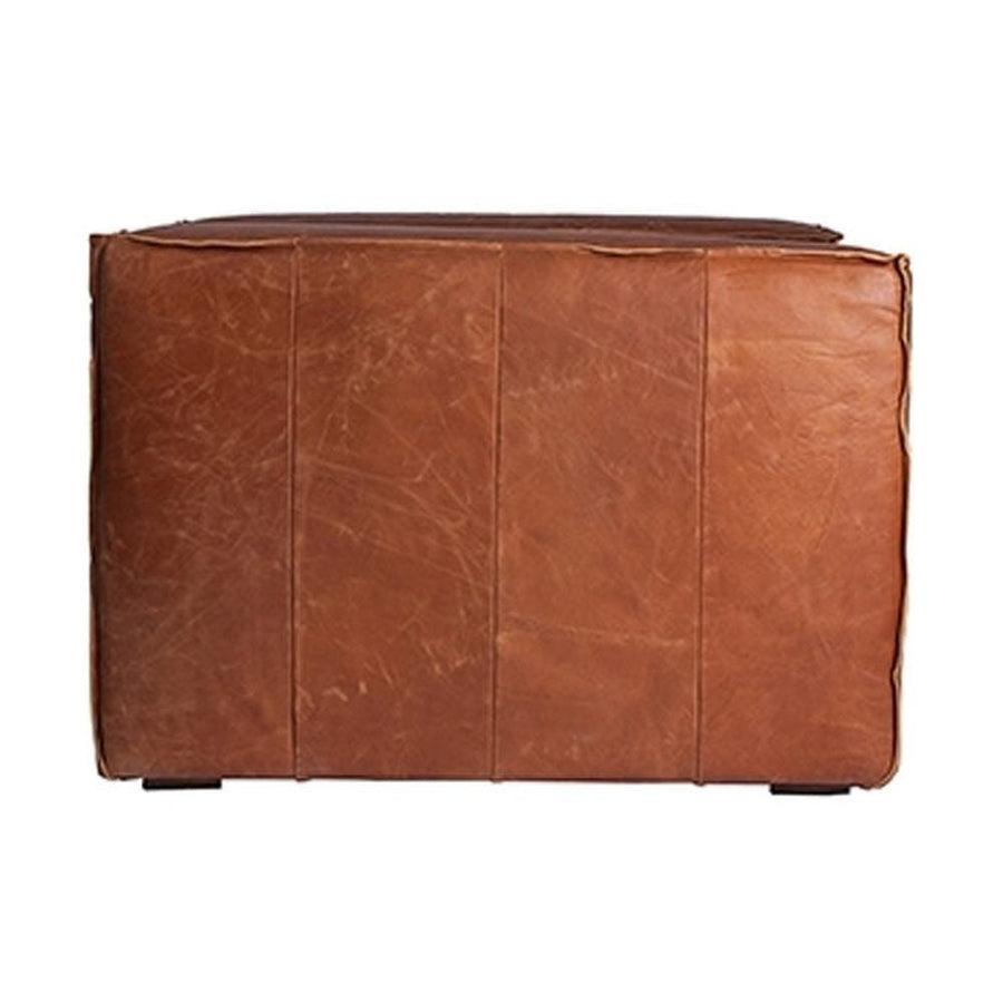 Kortárs loft stílusú, vintage dohány színű bőrfotel oldalnézete.