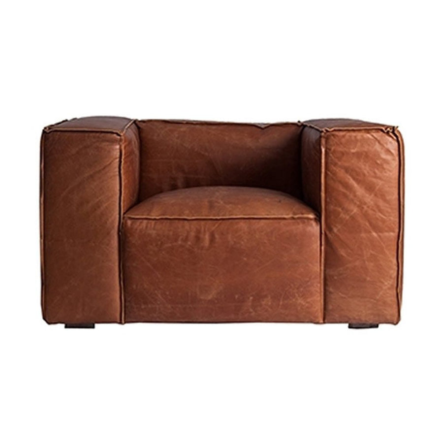 Kortárs loft stílusú, vintage dohány színű bőrfotel.