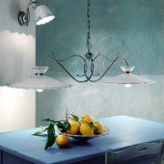 Kerámia falilámpa kék szobában.