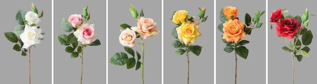 Rózsa művirágok, bordó, narancs, sárga, barack, pink és fehér színárnyalatú nyílt és bimbós virágfejekkel.