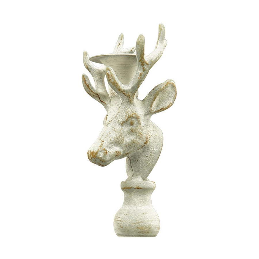 Fémből készült, szarvasfej gyertyatartóval. 