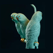 3 darab türkiszínű papagáj.