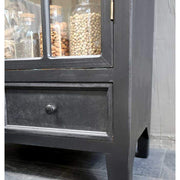 Antik fekete színű vitrines szekrény párkányzata alsó fiókja. 