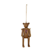 Vintage stílusú, 10 cm magas, függeszthető kialakítású, barna színű, fa hatású maci figura.