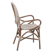 Vintage stílusú, természetes rattanból készült, bézs és barna színű kézműves karosszék.