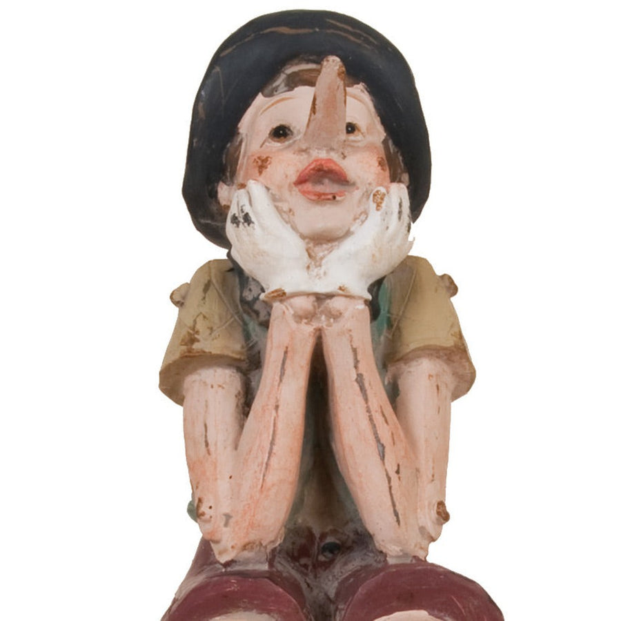 Vintage stílusú, ülő-könyöklő Pinokkió figura