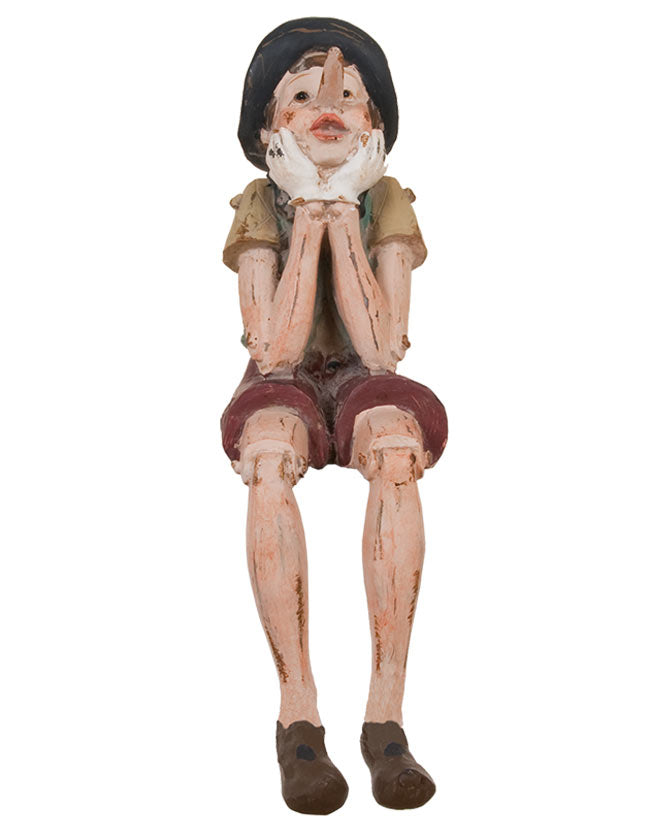 Vintage stílusú, ülő-könyöklő Pinokkió figura